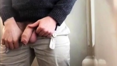 Thick uncut cock pissing